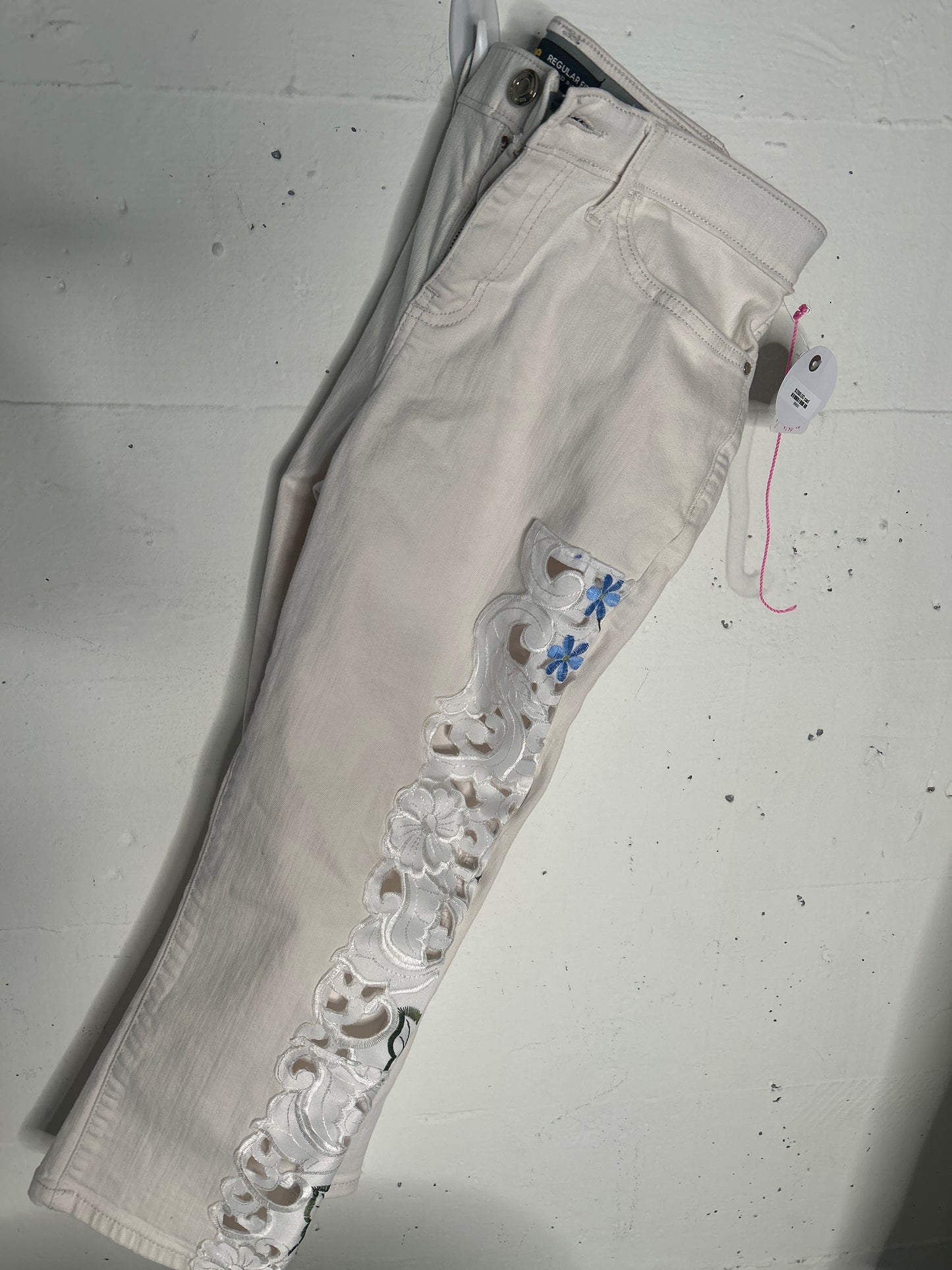 White denim with hand sewn details
